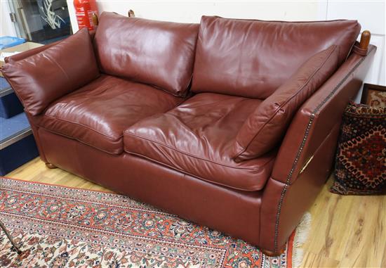 A brown leather drop end knole settee W.195cm